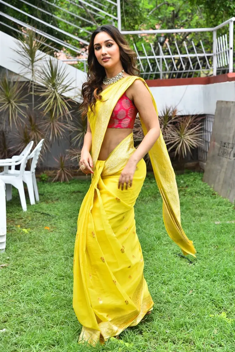 Akanksha Sharma Yellow Saree Red Sleeveless Blouse